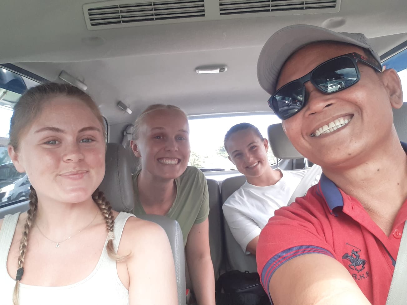 In-car selfie with clients