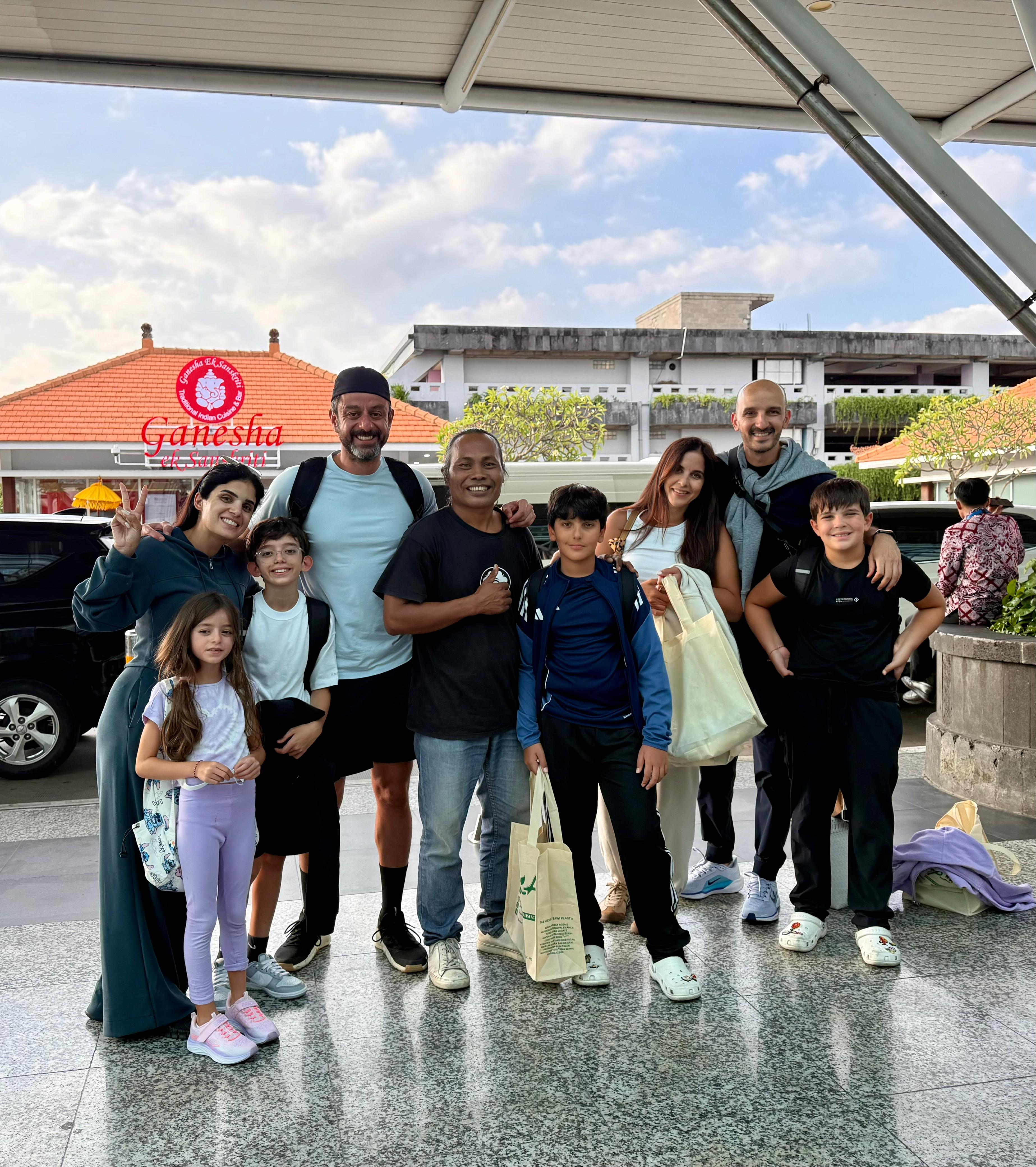 Large family group at Bali airport