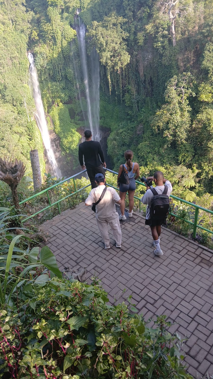 Guests at Sekumpul waterfall viewpoint