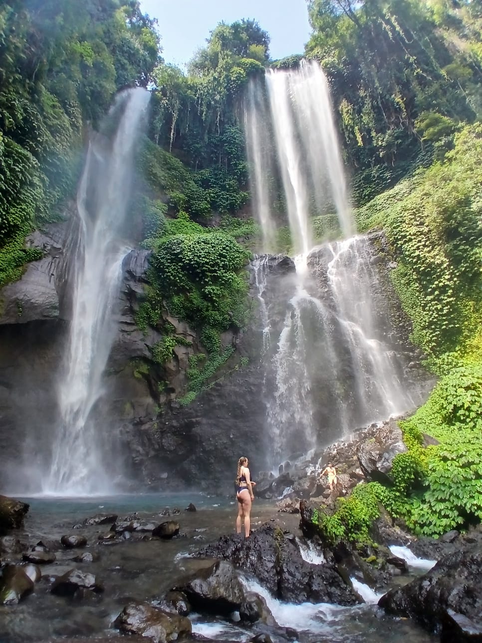 Guest swimming near Sekumpul waterfall